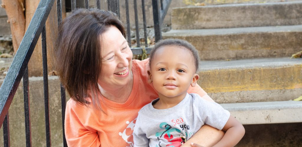 Woman holding child